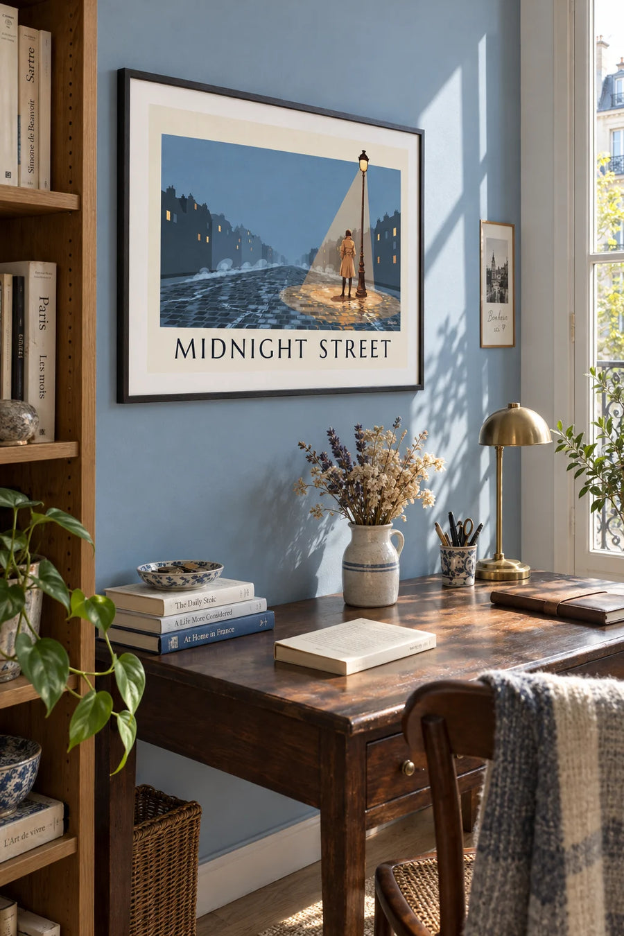 Poster of a woman in a trench coat under a streetlamp at night: framed on the wall