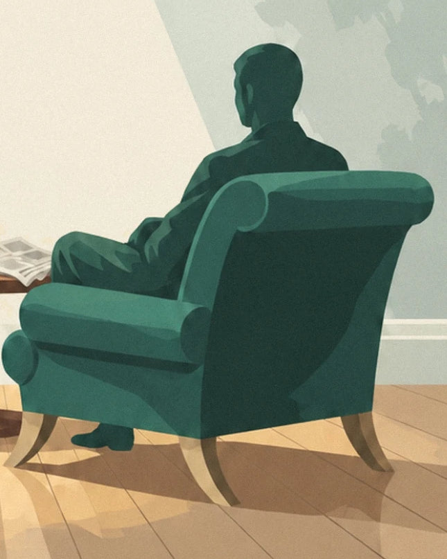 A figure seen from behind, sitting in a deep green armchair with rounded armrests