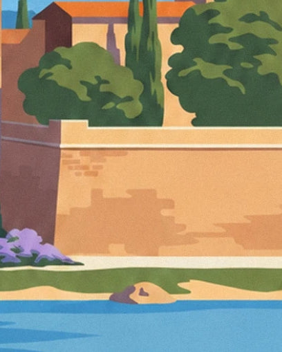An ochre wall lined with green trees, above the riverbank and blue water