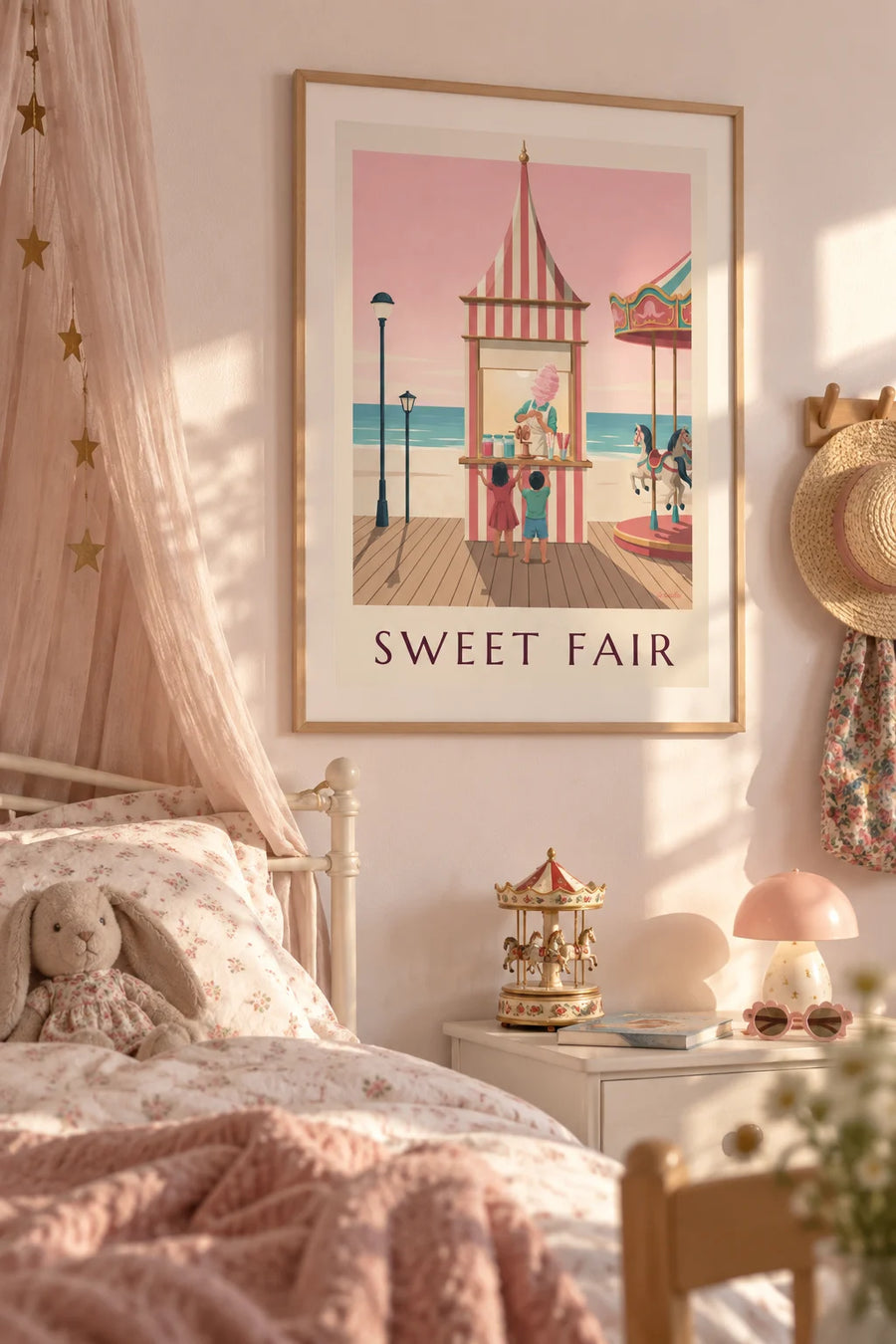 Poster of a cotton candy stand at a seaside fairground: framed on the wall