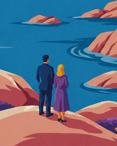 Das Paar mit Blick aufs Meer auf einem rosa Felsen, er im blauen Anzug und sie im violetten Mantel