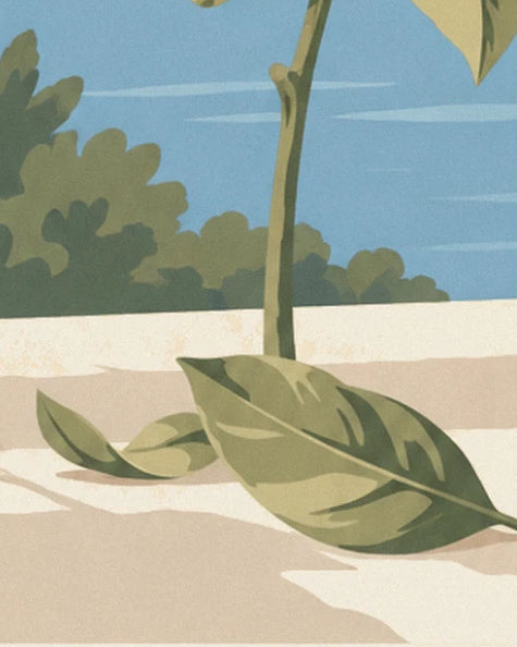 A large green leaf resting on a pale low wall, with a stem and foliage beneath a blue sky