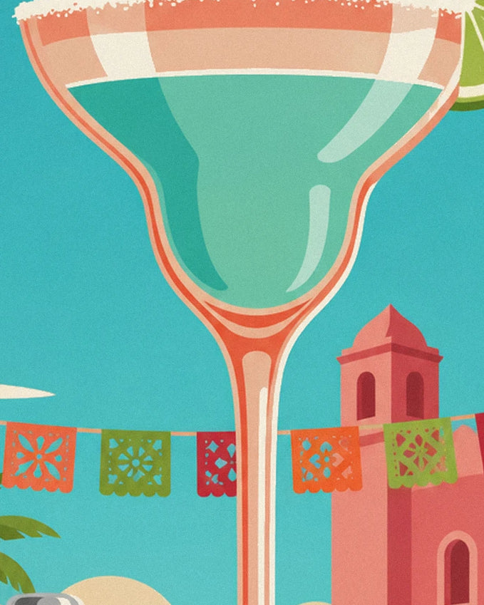 Le verre de margarita au long pied orangé devant les fanions colorés de la cantina