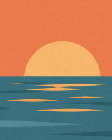 The golden sun on the horizon and its reflections on the turquoise sea beneath an orange sky
