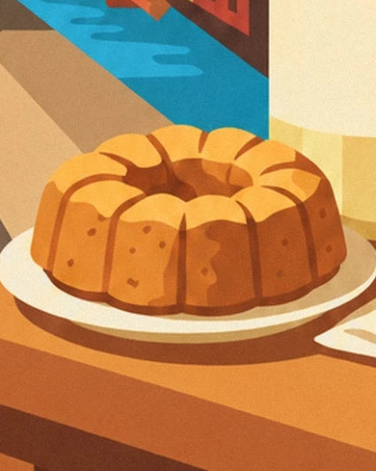 A golden kougelhopf on a white plate beside the canal