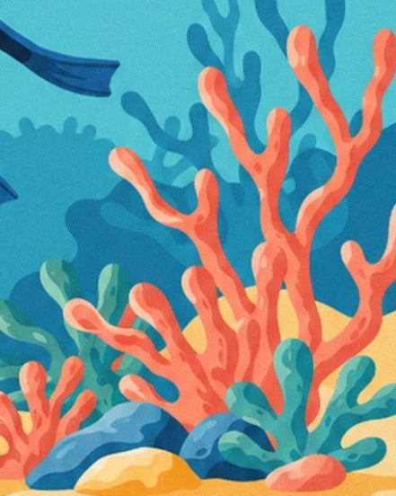 Les grandes branches de corail orangé parmi les rochers bleus et les algues