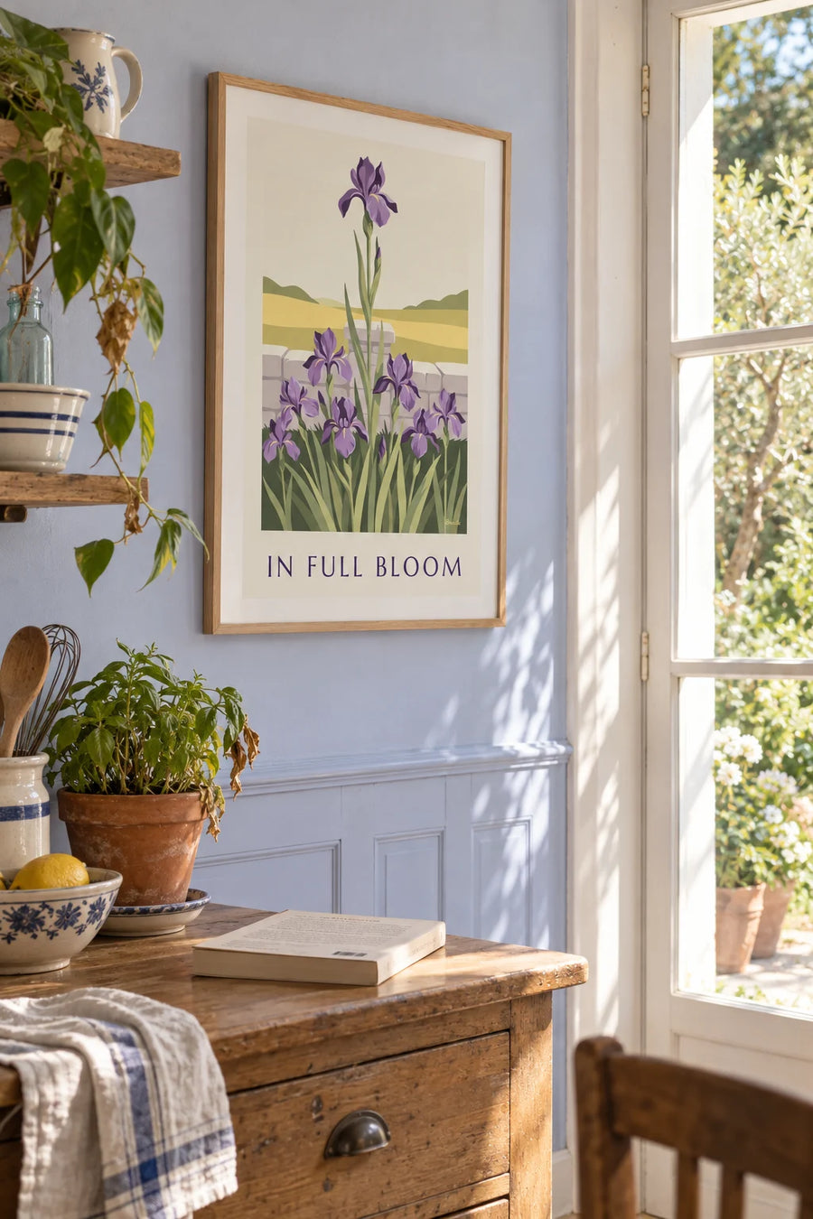 Poster of purple irises in full bloom in a garden: framed on the wall