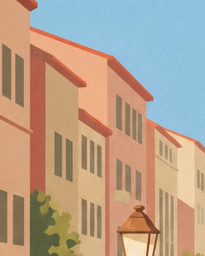 Les façades ocre et roses aux volets verts, avec un réverbère au pied des maisons