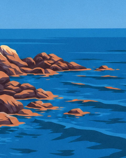 The ochre and brown rocks breaking the surface of a deep blue sea
