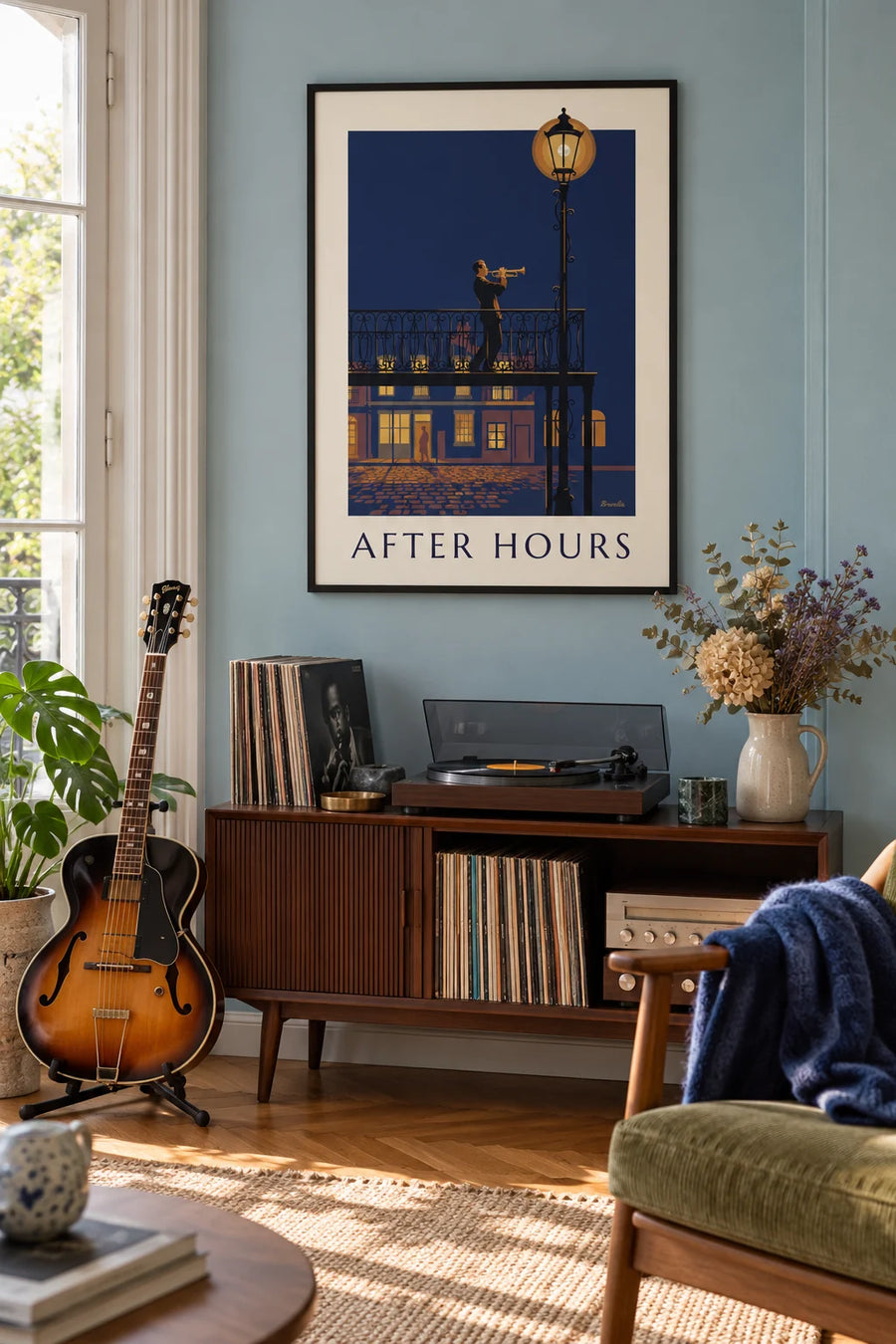 Poster of a jazz trumpeter on a wrought-iron balcony at night: framed on the wall