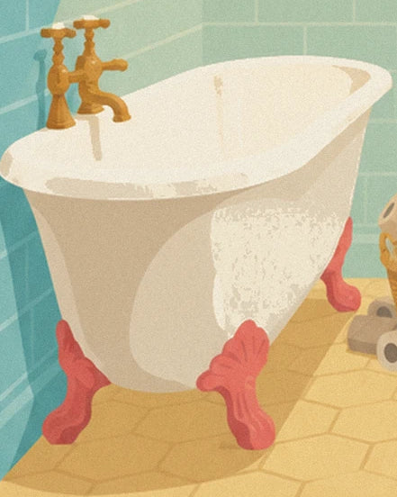 La baignoire blanche sur pieds roses avec sa robinetterie dorée et sa mousse