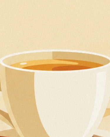 A white cup with cream highlights filled with an amber drink