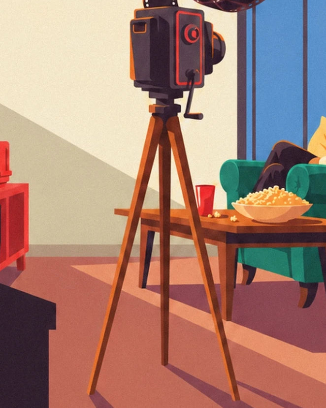 Die Kamera auf ihrem Holzstativ neben dem grünen Sessel und der Schüssel Popcorn