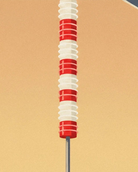 A column of red and white discs on a metal rod in front of a beige wall
