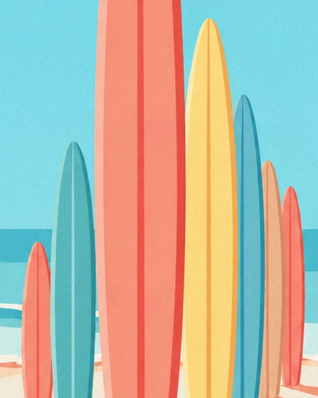 The coral, yellow and turquoise surfboards lined up on the sand