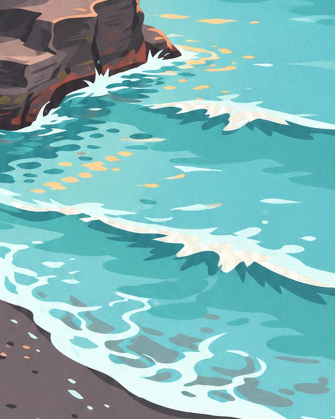 Les vagues turquoise qui viennent se briser contre les rochers, avec leur écume blanche