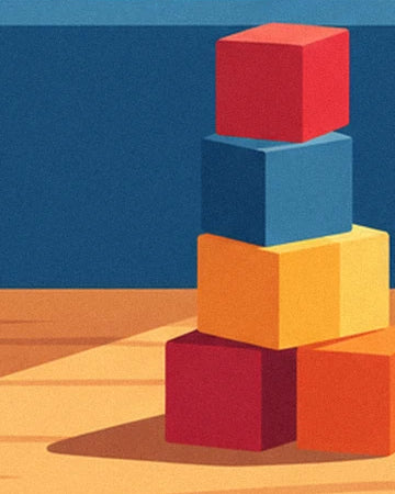 A stack of red, blue and yellow blocks on the wooden floor of the toy shop