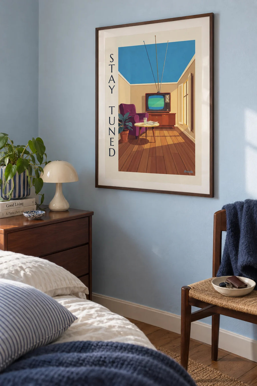 Poster of a cathode-ray television and a glowing grid pattern: framed on the wall