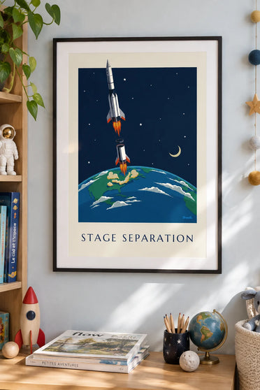 Poster of rocket stages separating above the Earth: framed on the wall