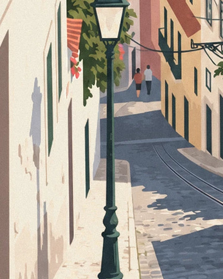 The green street lamp beside a cobbled lane, where 2 people walk downhill between pale façades