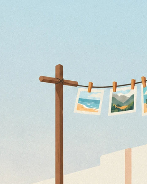 The wooden post and its washing line, with pegs and photos of beaches and mountains