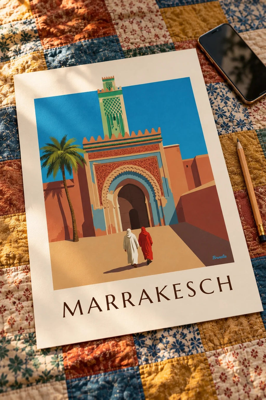 Poster Bab Agnaou und Minarett in Marrakesch: flach auf einem Tisch