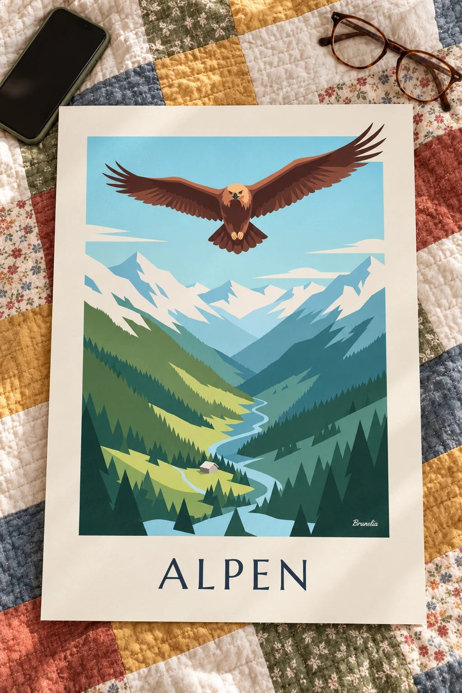 Poster Steinadler über einem Alpental: flach auf einem Tisch
