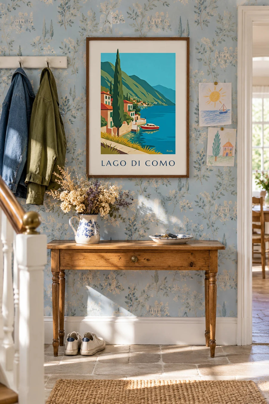Poster of the shores of Lake Como and a wooden boat: framed on the wall