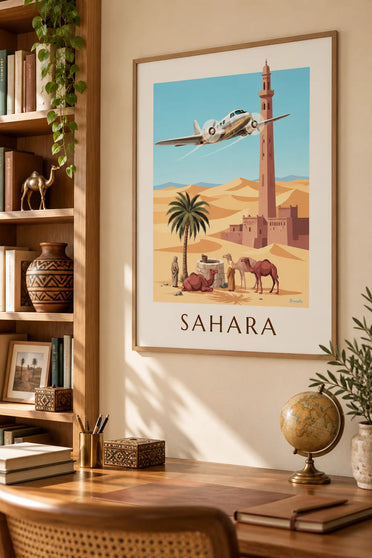 Affiche avion trimoteur survolant une oasis et les dunes du Sahara : encadrée au mur