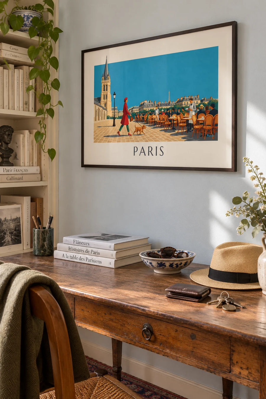 Poster of a woman and her dog on Place Saint-Germain-des-Prés in Paris: framed on the wall