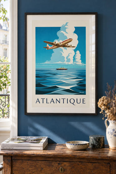 Poster of a four-engine plane over the Atlantic: framed on the wall