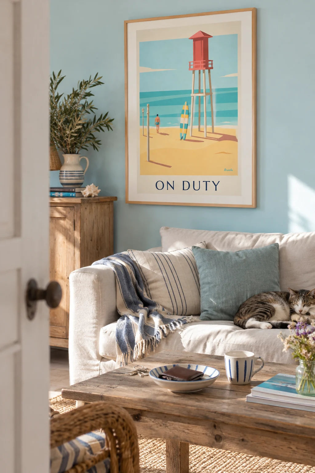 Surfboard and lifeguard tower on the beach poster on the wall